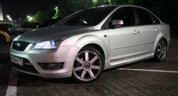 6 999 р. Пороги накладки ST  Ford Focus  2 (2004-2011)  седан дорестайлинг, хэтчбэк 5 дв. дорестайлинг, седан рестайлинг, хэтчбэк 5 дв. рестайлинг (Неокрашенные)  с доставкой в г. Омск. Увеличить фотографию 4