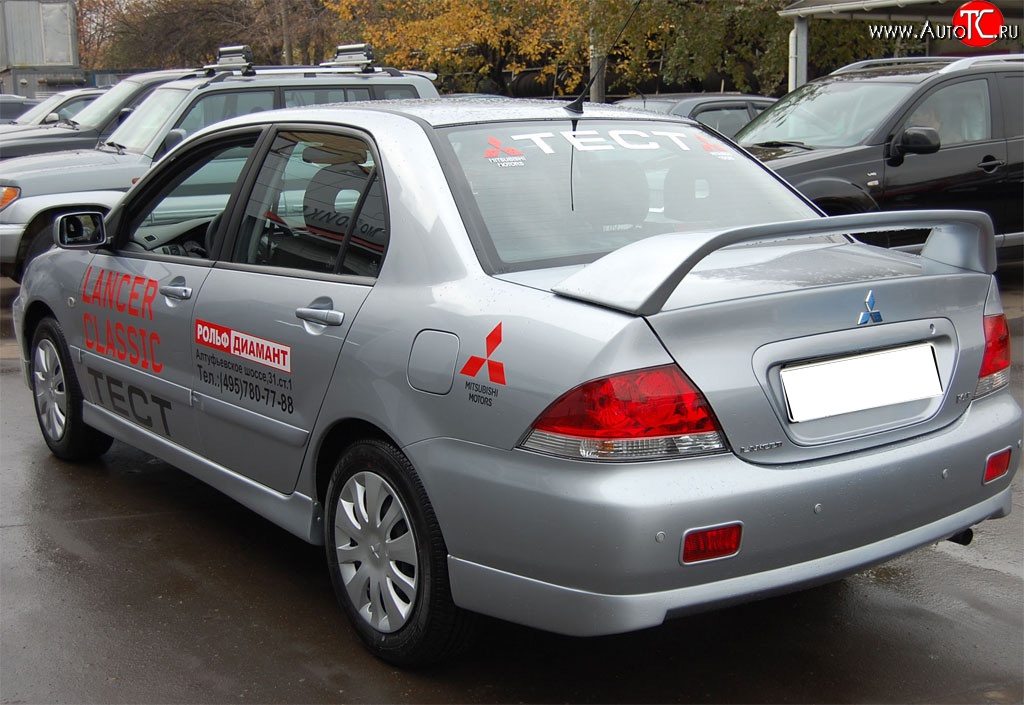 4 249 р. Накладка заднего бампера GT Dynamics Mitsubishi Lancer 9 2-ой рестайлинг седан (2005-2009) (Неокрашенная)  с доставкой в г. Омск