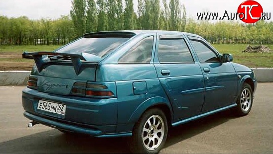 1 099 р. Нижний спойлер Кураж Toyota Corolla E120 хэтчбек 5 дв. дорестайлинг (2000-2004) (Неокрашенный)  с доставкой в г. Омск