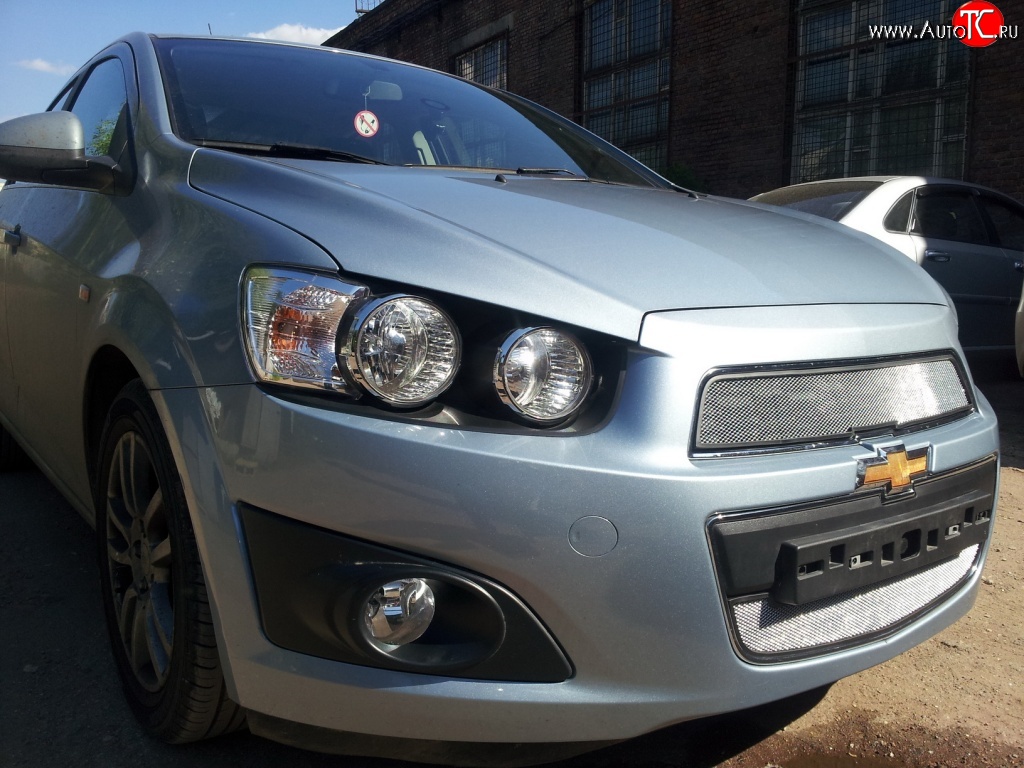 1 539 р. Нижняя сетка на бампер Russtal (хром)  Chevrolet Aveo  T300 (2011-2015) седан, хэтчбек  с доставкой в г. Омск