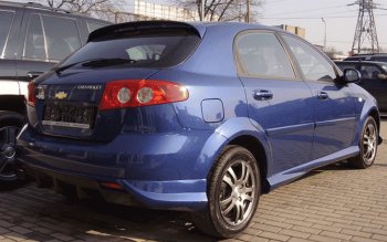 4 099 р. Накладка заднего бампера ATL  Chevrolet Lacetti  хэтчбек (2002-2013) (Неокрашенная)  с доставкой в г. Омск. Увеличить фотографию 1