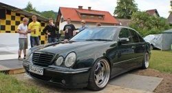 12 599 р. Передний бампер AMG Mercedes-Benz E-Class W210 дорестайлинг универсал (1996-1999) (Неокрашенный)  с доставкой в г. Омск. Увеличить фотографию 1