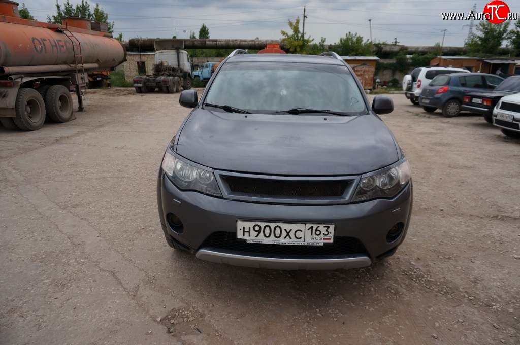 5 449 р. Решётка радиатора (рестайлинг) Sport Mitsubishi Outlander XL (CW)  рестайлинг (2010-2013) (Неокрашенная)  с доставкой в г. Омск