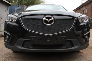 799 р. Зимняя заглушка решетки радиатора (с парктроником) PREMIUM Стрелка11 Mazda CX-5 KE дорестайлинг (2011-2014) (черная)  с доставкой в г. Омск. Увеличить фотографию 2